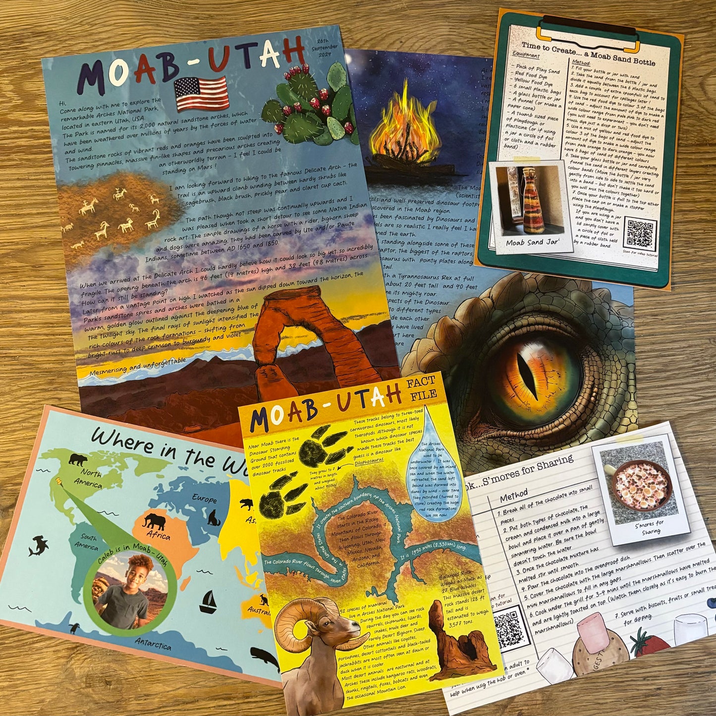 Letters and activity cards about the Moab laid flat on a wooden table.